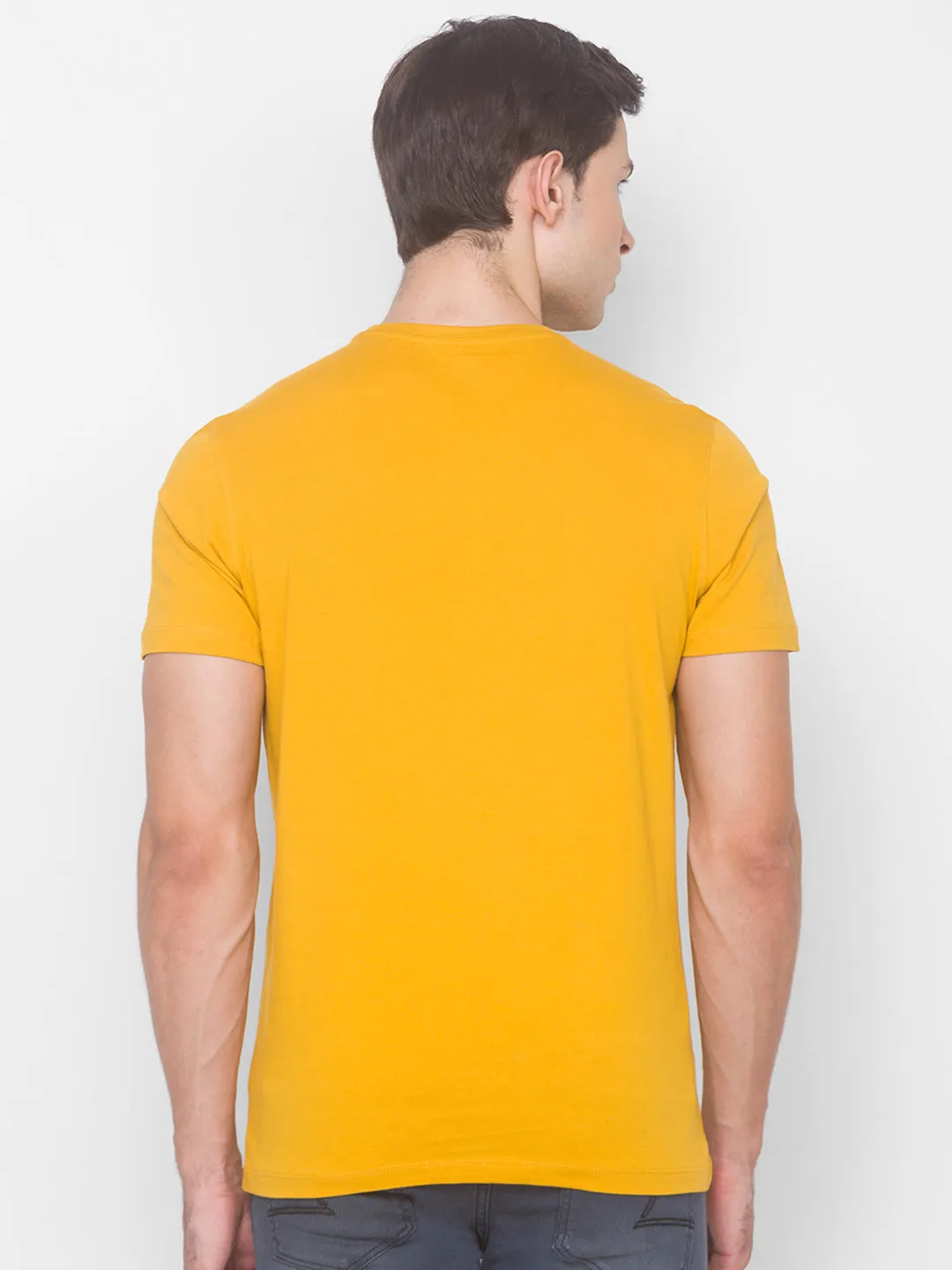 Charlie Chaplin Spykar Men Yellow Cotton Slim Fit Round Neck T-Shirt